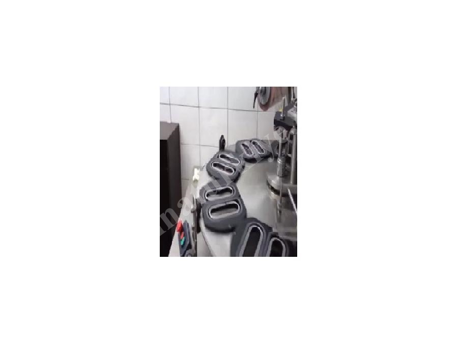 SEZ 16 Süße Folienkappende Maschine