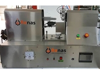 Machine automatique de fermeture de tubes ultrasoniques à détecteur optique - 1