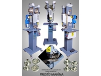 Machine automatique de pose de 61 boutons pression