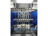 Automatische Flüssigkeitsfüll- und Verschließmaschine mit 6 Düsen - 3