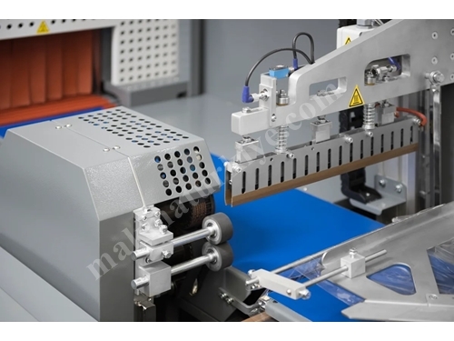 Sympack 35 Tunnel Continuous Cutting Shrink Machine