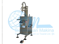 Single Nozzle Manual Liquid Filling Machine 100-250 gr - 1