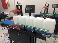 Machine de test de trous pour bouteilles en plastique - 1