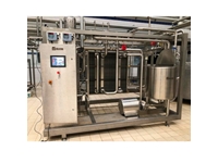 Système de pasteurisation à préchauffage