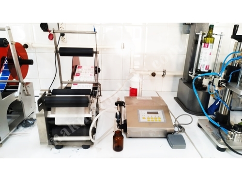 Sıvı Dolum Makinası + Silindirik Şişe Etiketleme Makinası