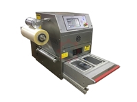 Machine de fermeture de plateaux semi-automatique TS 100