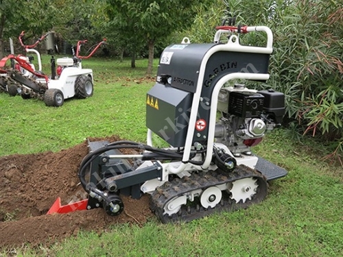 Machine hydraulique à ouvrir les canaux de terre avec palette 