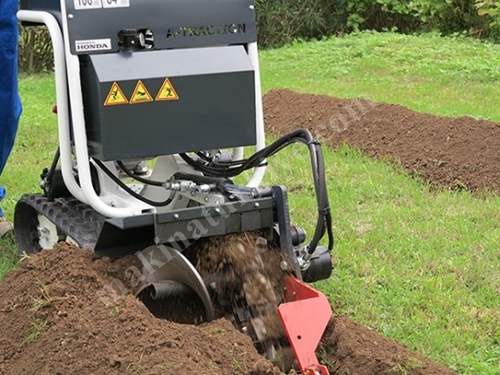 Machine hydraulique à ouvrir les canaux de terre avec palette 