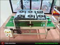 Systèmes de bande transporteuse avec ventilateur pour machines d'injection