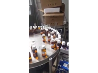 Machine automatique d'étiquetage de bouteilles - 1