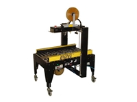 Box Strapping Machine 300 - 720 pieces per hour - 0