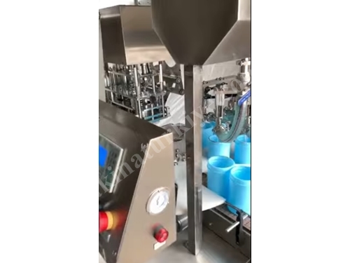 Remplisseuse automatique de lingettes humides rotative