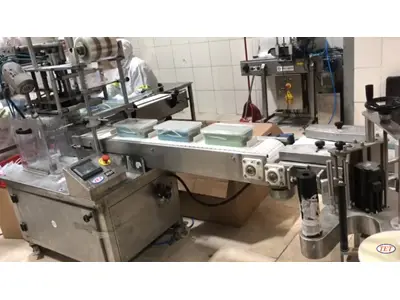 Machine automatique de fermeture de film plastique
