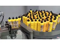 Machine automatique d'étiquetage de bouteilles Tet Makina 