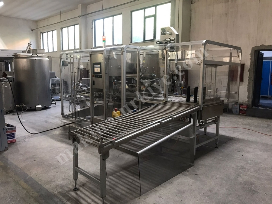 İlaç Koli Hazırlama Makinası ( Dizme Bantlama Etiketleme ) (Used Case Packer)