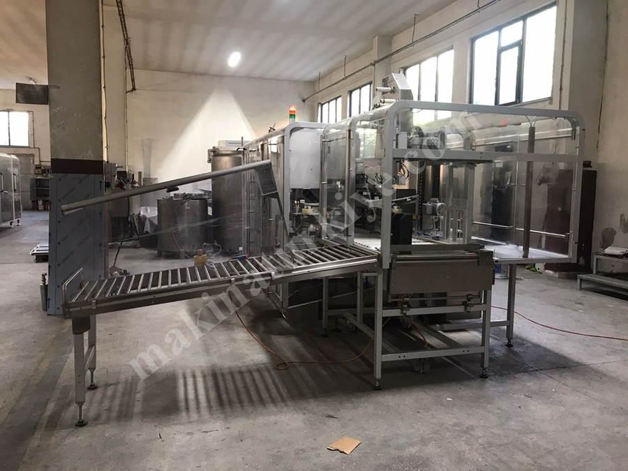 İlaç Koli Hazırlama Makinası ( Dizme Bantlama Etiketleme ) (Used Case Packer)