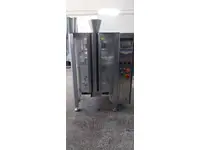 Machine d'emballage vertical de lait en poudre