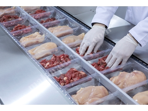 Machine d'emballage de viande et de produits carnés sous vide / gaz (MAP) à pression modifiée