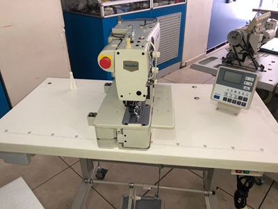 Machine à boutonnière à moteur frontal - 1