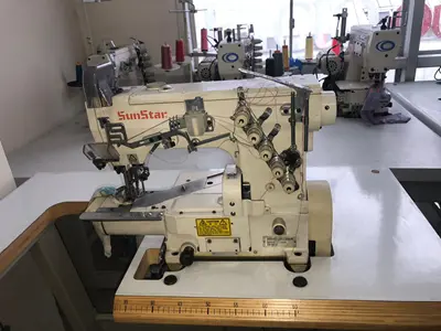 Machine de couture avec nez mécanique