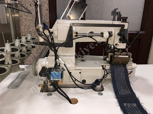 Machine automatique à plisser les bandes de caoutchouc de type Siruba à 10 aiguilles