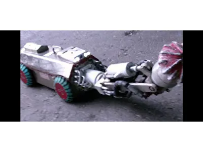 Earthquake Debris Rescue Robot from Under Rubble with Living or Dead