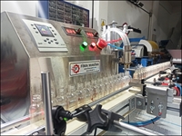 Machine de remplissage automatique de bureau de la série FMD pour 10-100 ml - 0