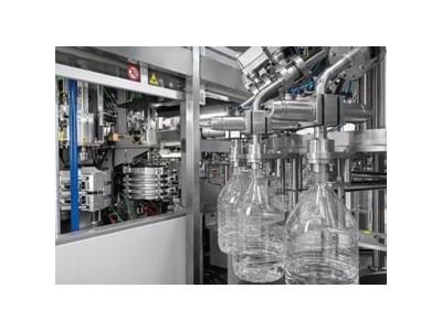 Machine de soufflage et de remplissage de bouteilles - 1
