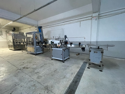 8-Nozzle Linear Volumetric Liquid Filling Machine - 1