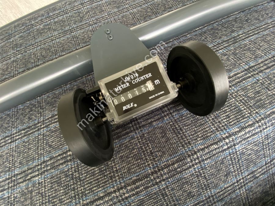 Fabric Control and Meter Machine