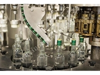 Machine de plastérisation de capsules en aluminium pour bouteilles en verre - 3