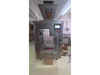 Machine d'emballage verticale à vis à 4 voies de Fmk Makina
