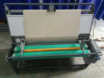 Машина для контроля качества ткани на шатетипе