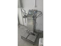 Eco Series Double Nozzle Weighing Liquid Filling Machine - 2