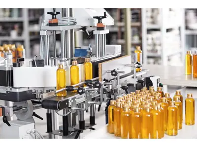 Machine de remplissage pour 100 bouteilles de produits pharmaceutiques ou de médicaments