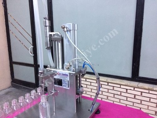 10-100-1000Ml 400-600 Units / Hour Pneumatic Manual Liquid Filling Machine