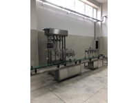 Machine de remplissage de liquides avec balance, 500g-50kg, 450-900 pièces / heure - 0