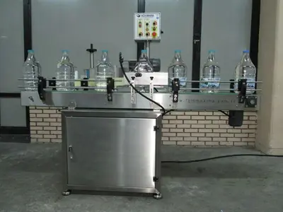 Машина для наложения круглой этикетки на бутылки от 4000 до 6000 штук в час