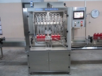 Machine de remplissage et de capsulage de liquides servo de 100 ml à 1000 ml - 4