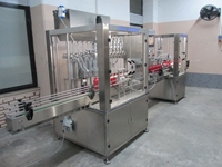 Machine de remplissage et de capsulage de liquides servo de 100 ml à 1000 ml - 2