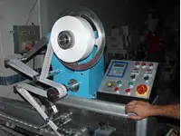 Machine à emballer les morceaux de sucre en cubes