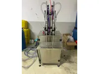 2 Nozzles Volumetric Manual Liquid Filling Machine