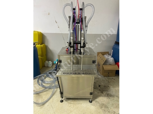 2 Nozzles Volumetric Manual Liquid Filling Machine