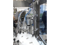 Rotary Cream Filling And Capping Machine - 11