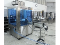 Rotary Cream Filling And Capping Machine - 7