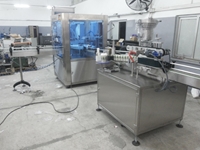 Rotary Cream Filling And Capping Machine - 8