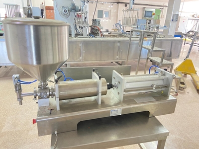 100-500 ml (5-20 Stück/Minute) Manuelle Einzelnozzle Schokoladenfüllmaschine - 2