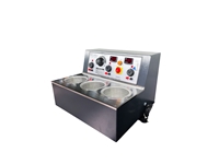 Machine à rodage de bain triple
