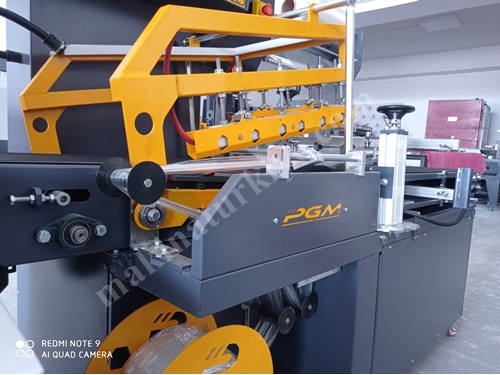 Machine de conditionnement sous film rétractable à coupe L entièrement automatique