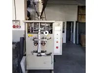 Machine de remplissage vertical à vis